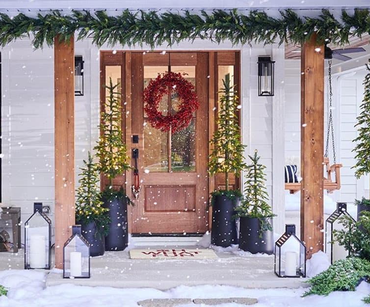 Scandi inspired Christmas log cabin porch