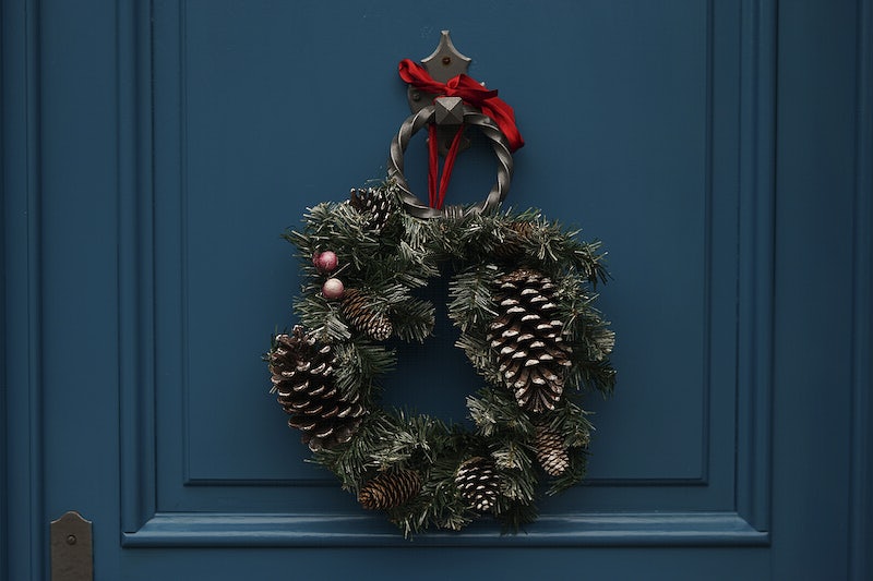 Small pine cone wreath with red ribbon