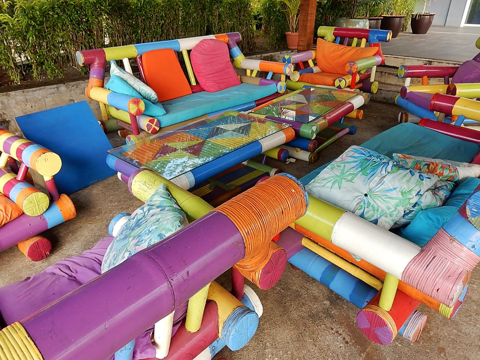 Colourful painted wooden patio chairs