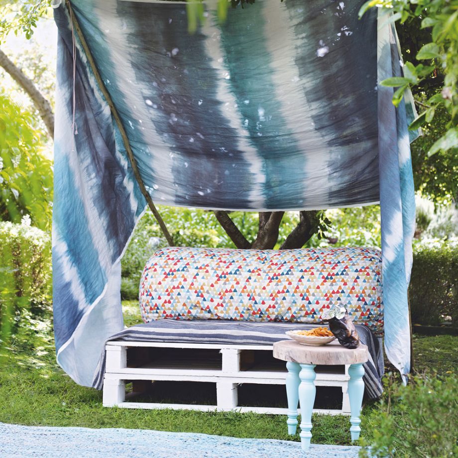 DIY cabana with pallet seating area