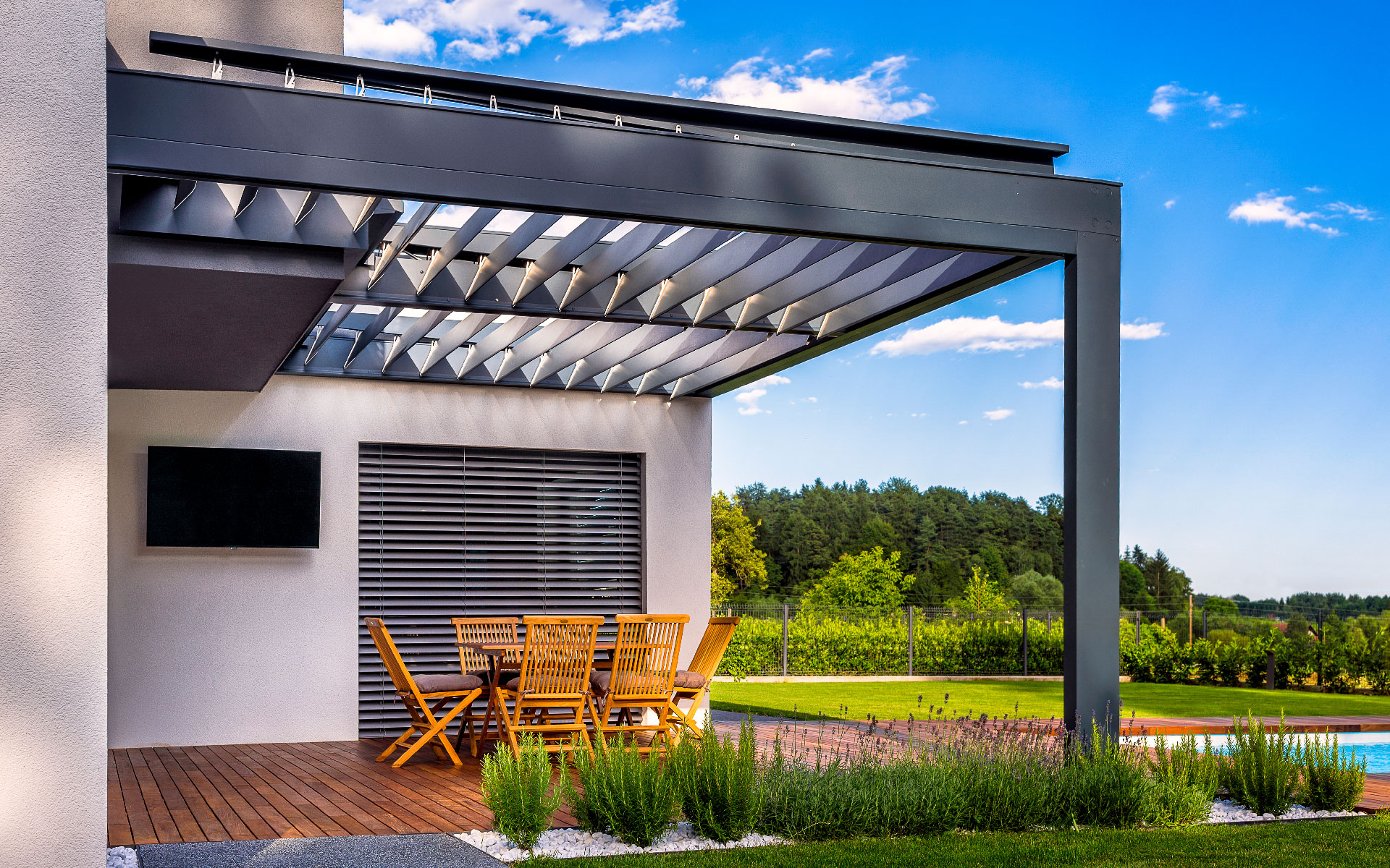 Modern patio with metal pergola and outdoor dining area