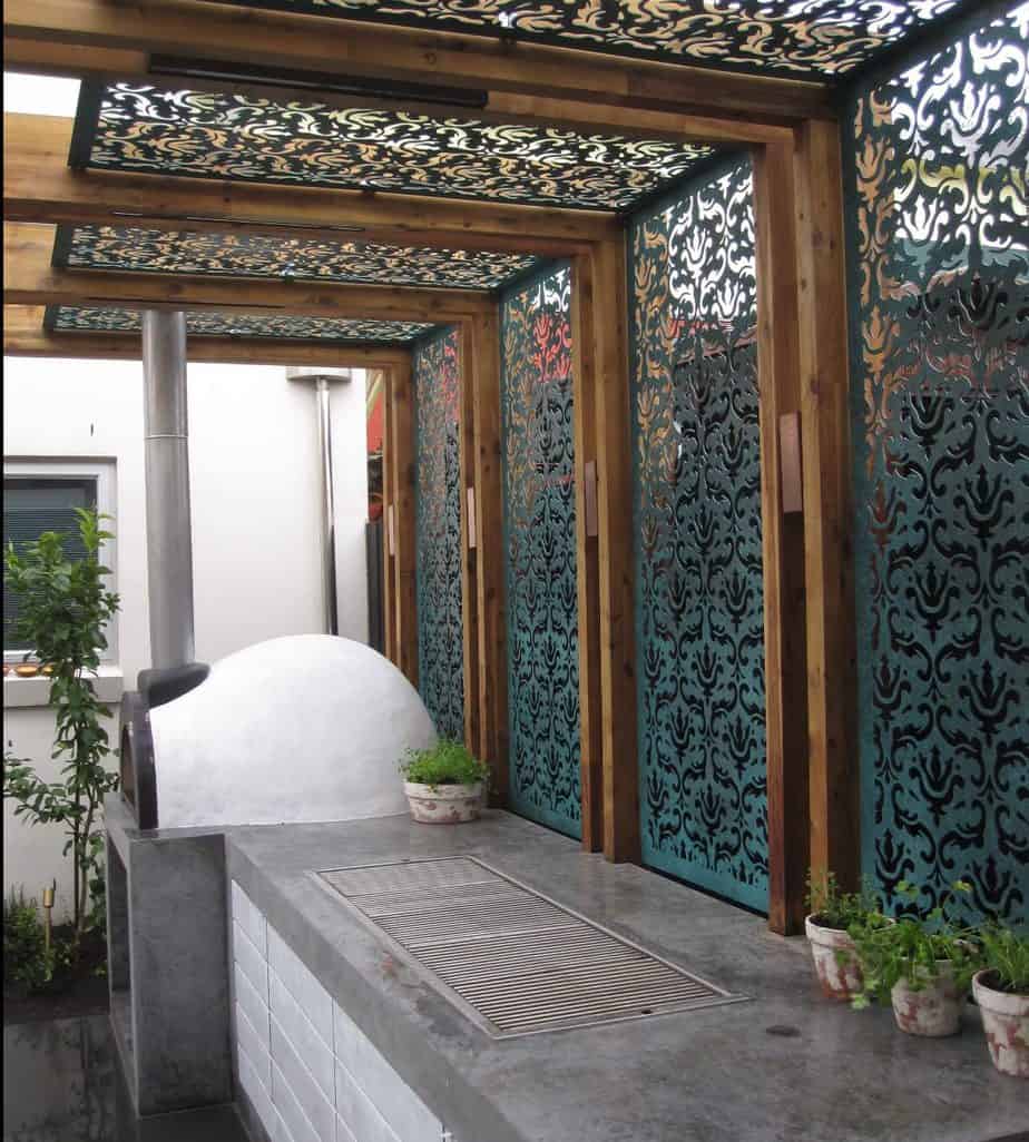 Garden pergola with patterned screen