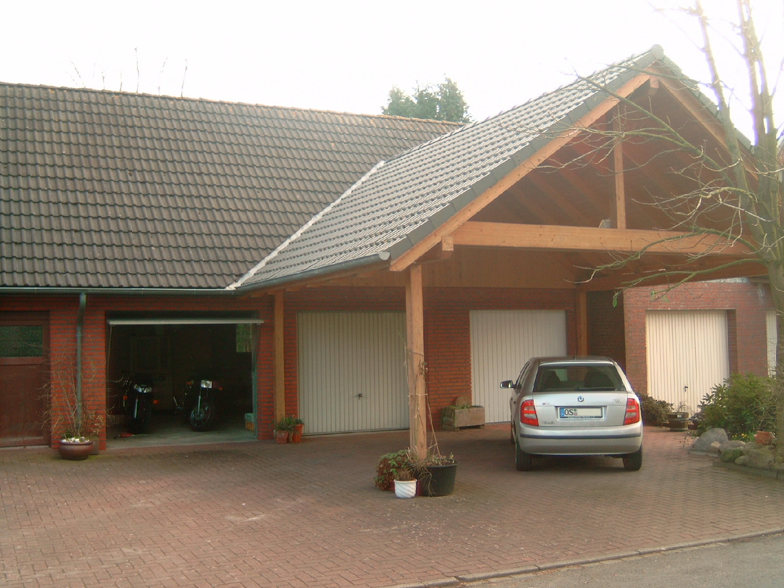 Carport and garage in one setting