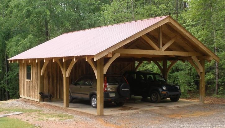 A carport with a storage shed in the back