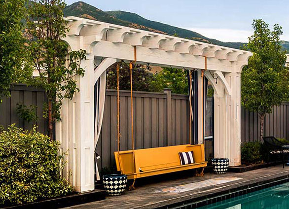 Customised poolside arbour with swinging bench