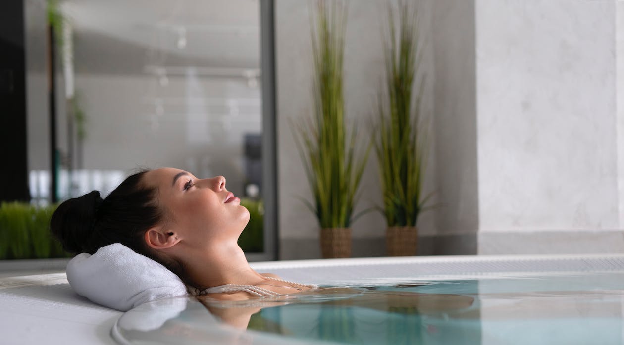 A women on a hot tub spa