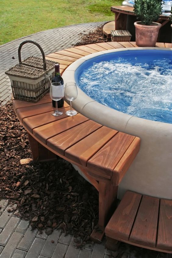 Inflatable hot tub with deck