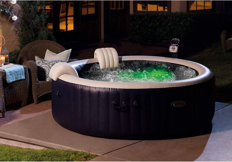 Inflatable hot tub with headrests