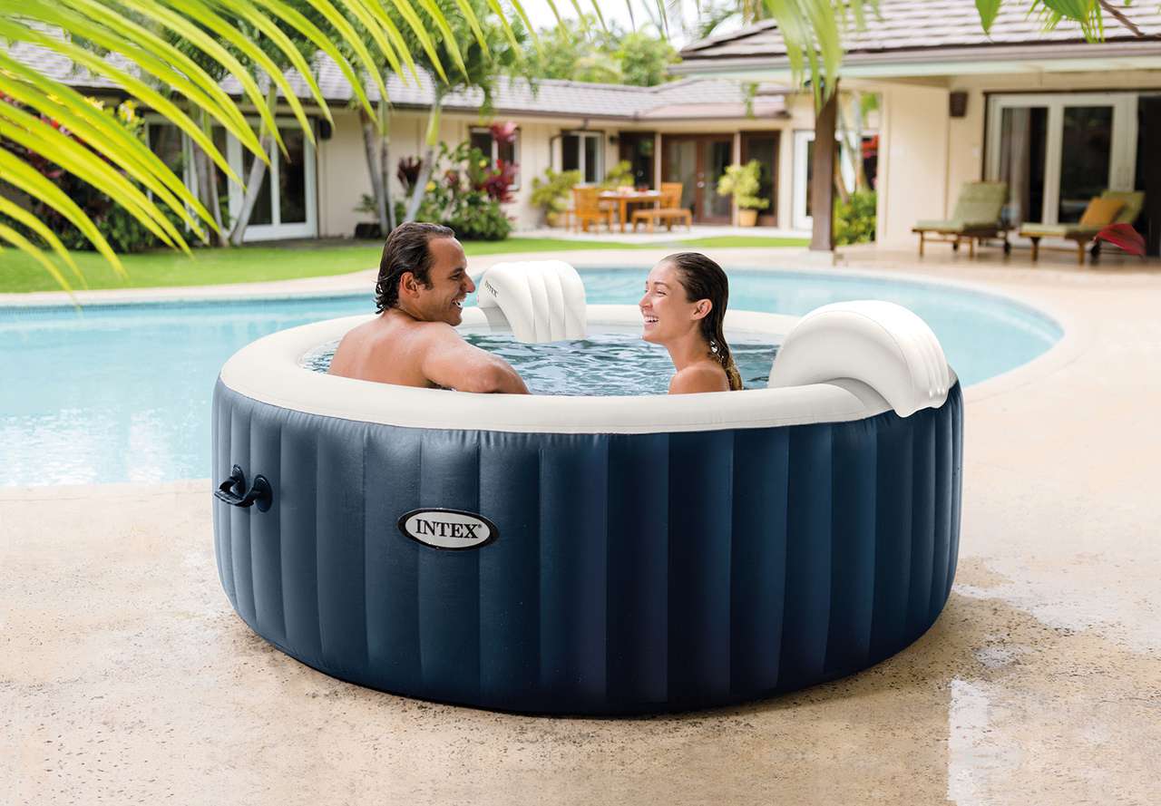 Inflatable hot tub with pillows for comfort