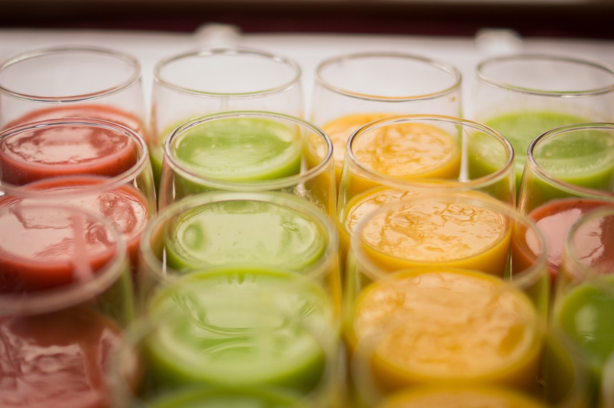 Various fruit shake flavours on glass cups
