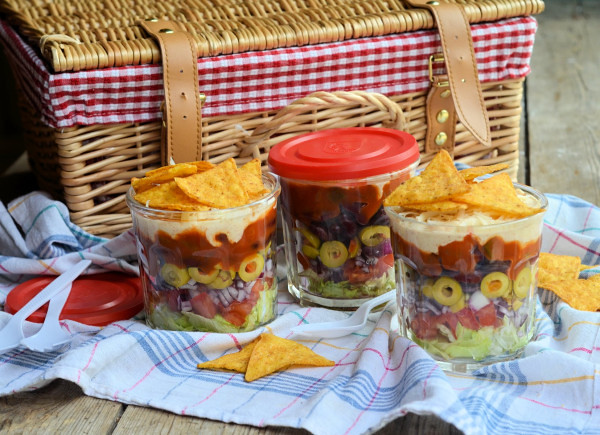 Homemade picnic salad on glass jars