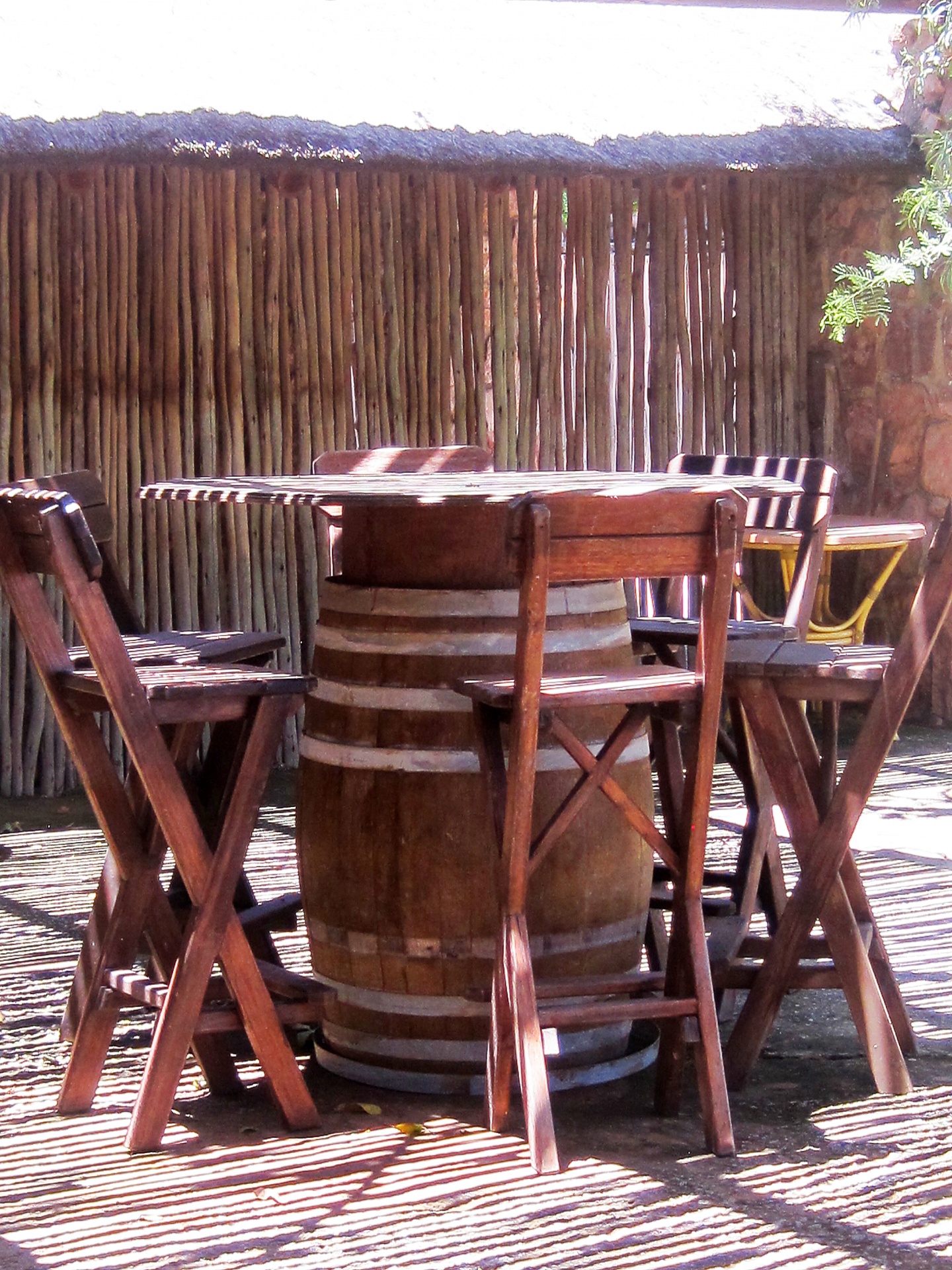 Outdoor barrel table and chairs set
