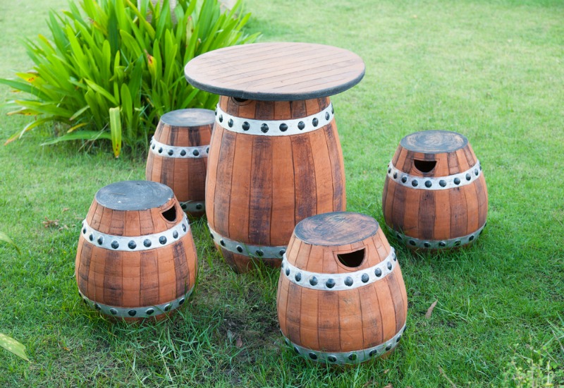 Barrel table and stools outdoor pieces