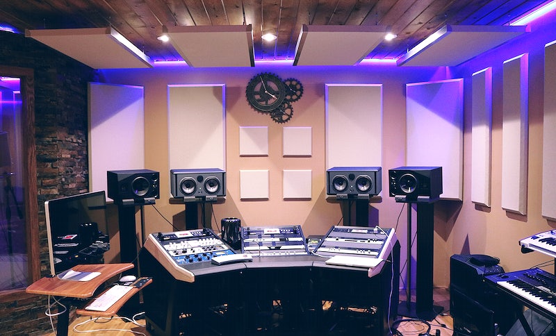 Log cabin private studio with consoles and equipment