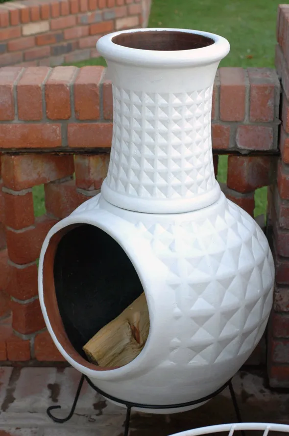 DIY chiminea painted in white