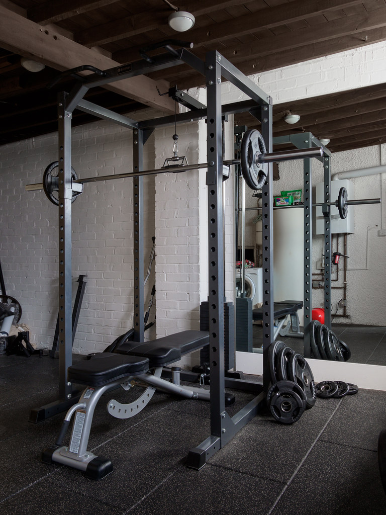 Garage gym conversion with pull-up bars