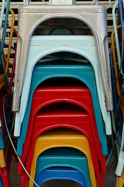 Colourful stacked chairs