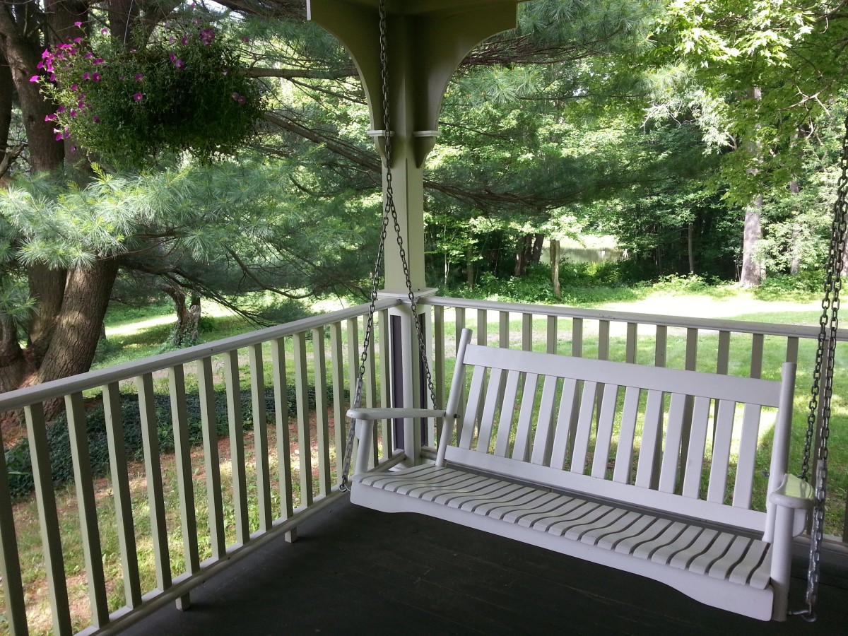 White porch bench swing
