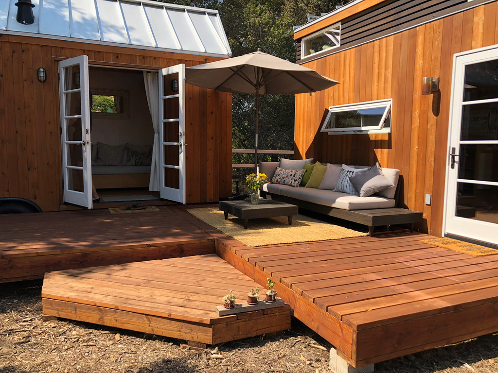 A decking that connects to the house and garden room