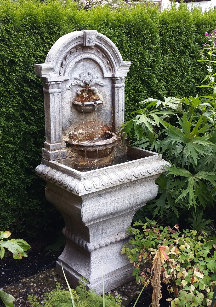 Classic water feature fountain in an English garden