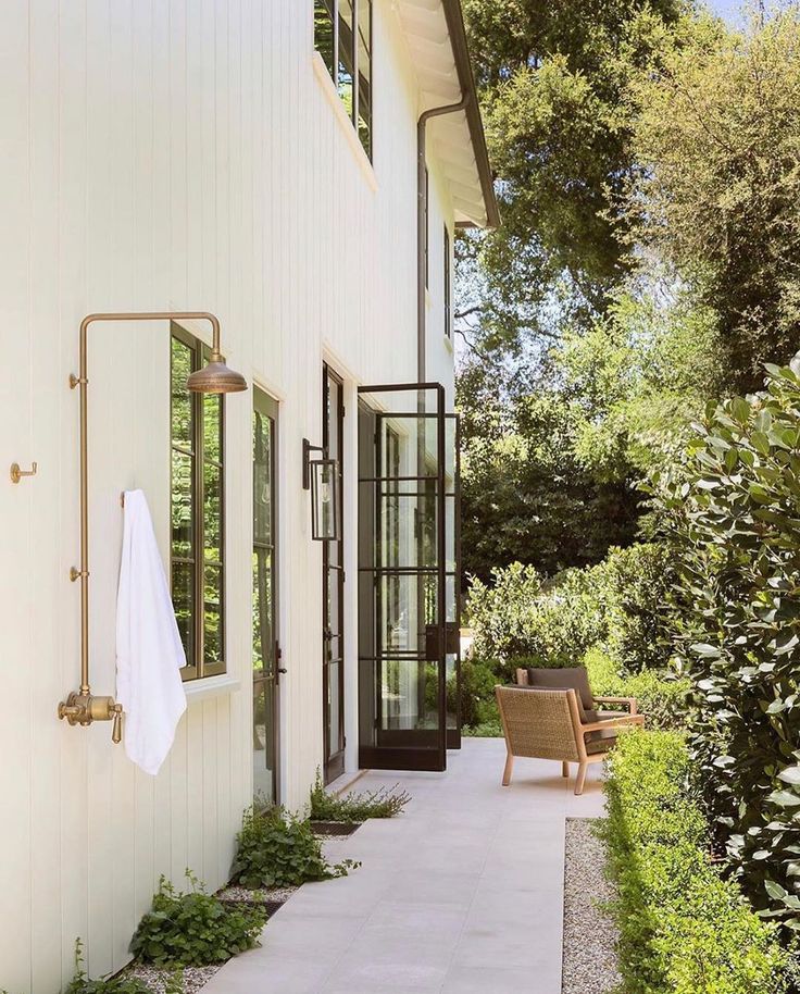French garden design with outdoor shower setup