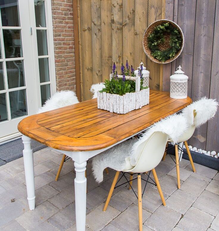Wooden garden table with carved legs