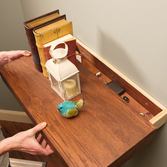 Floating shelf with hidden storage for a safe box
