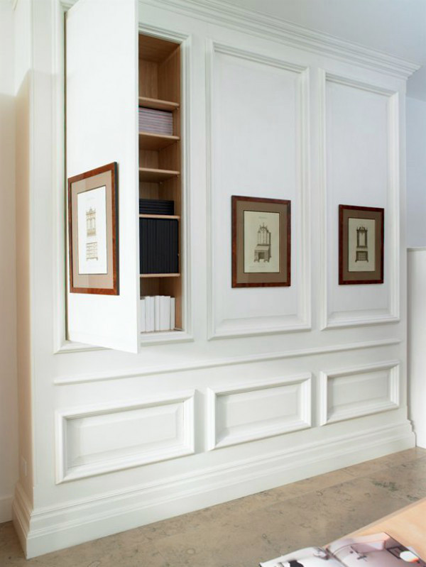 Panelled wall with hidden storage unit