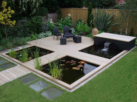Small garden decking with garden pond