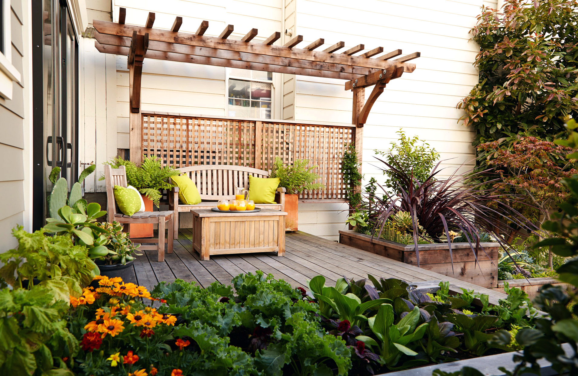 Small garden decking with a pergola attached