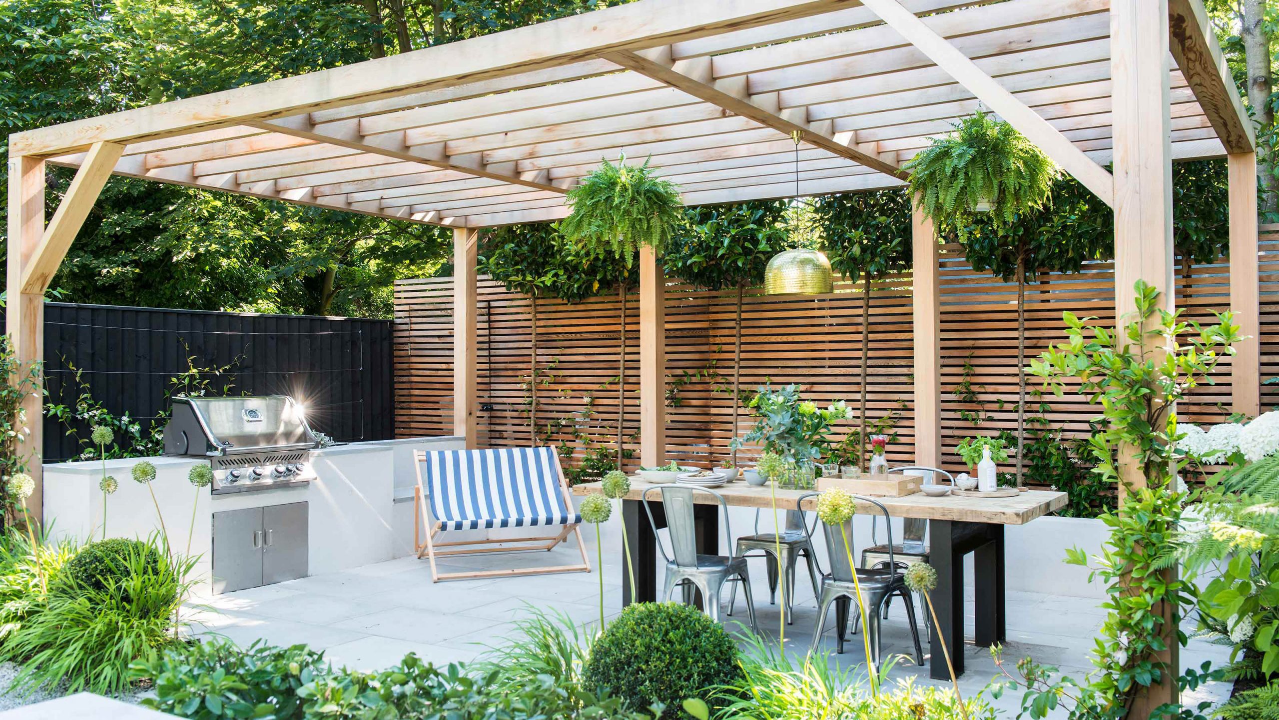 Summer garden idea with a pergola patio