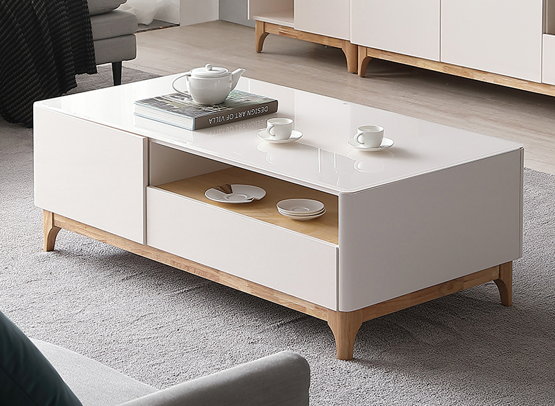 A white coffee table with storage compartments