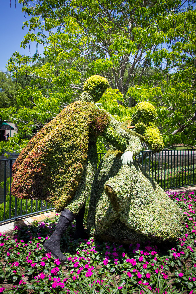 Sculptural form of a topiary, featuring Sleeping Beauty and the Prince.