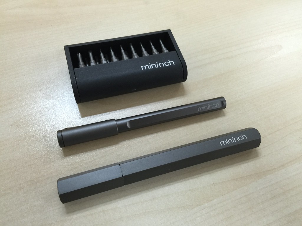A set of metallic black multi-tool pen