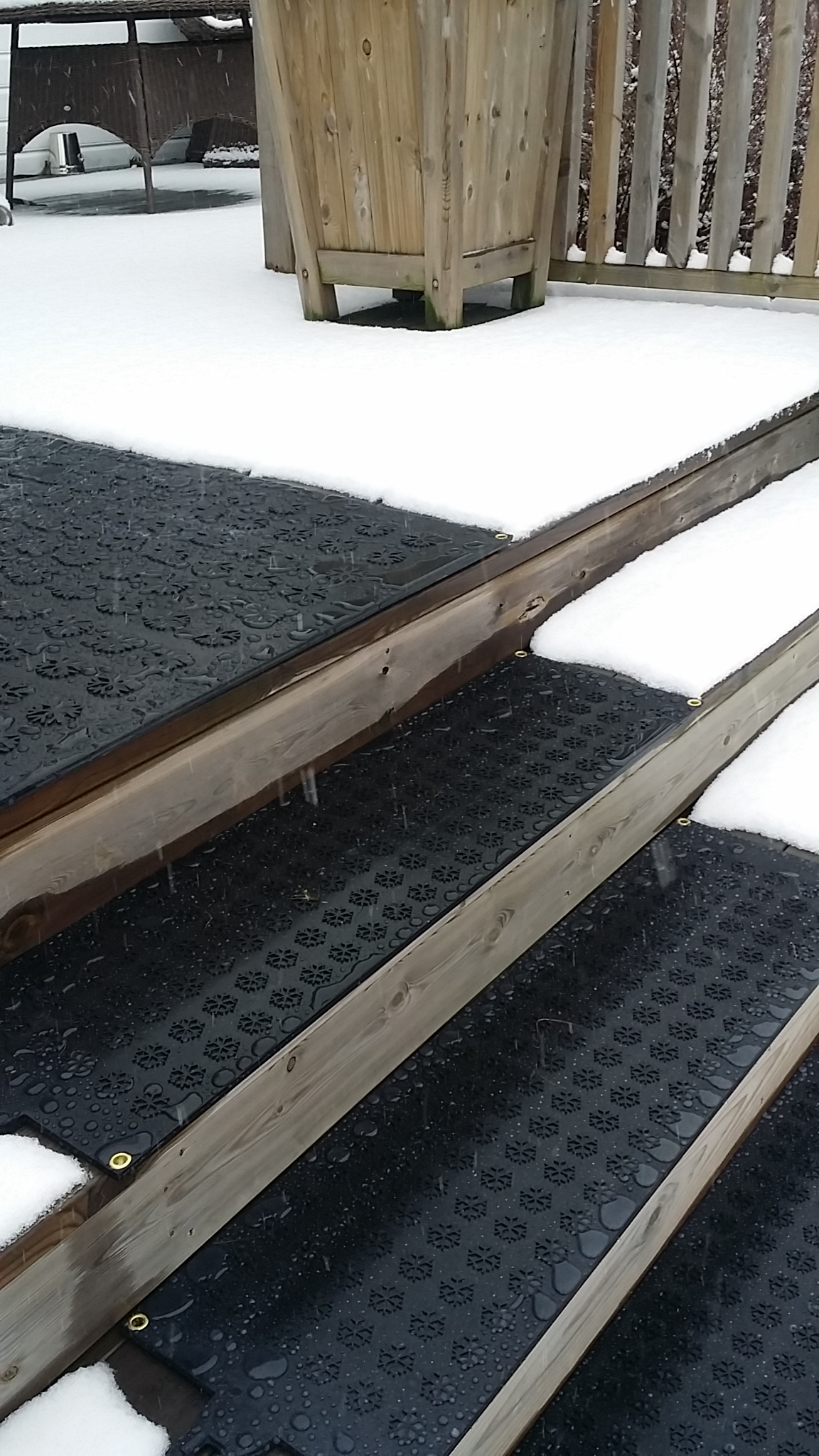 Heated snow melting mats installed on deck steps