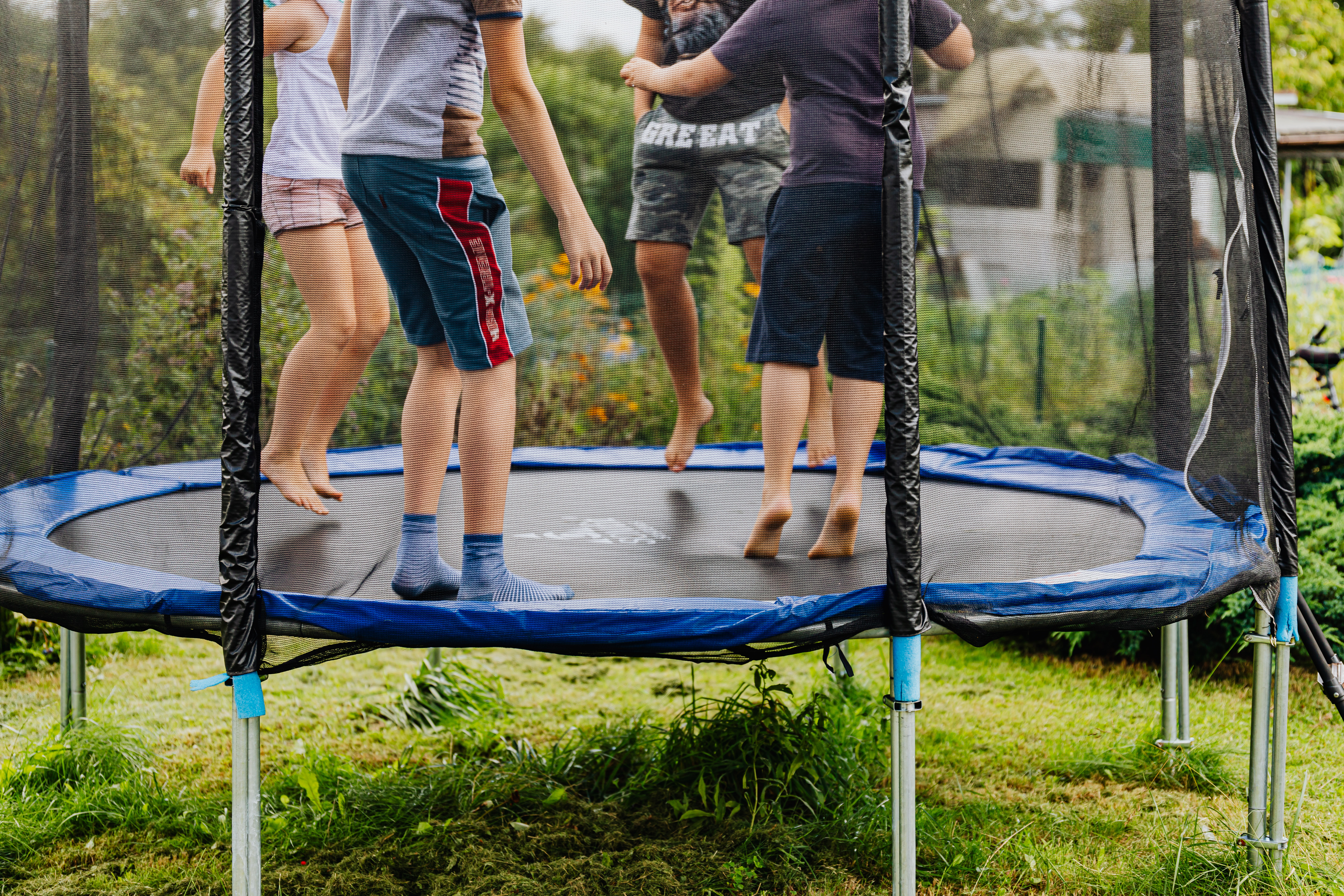 Kids on an outdoor trampoline