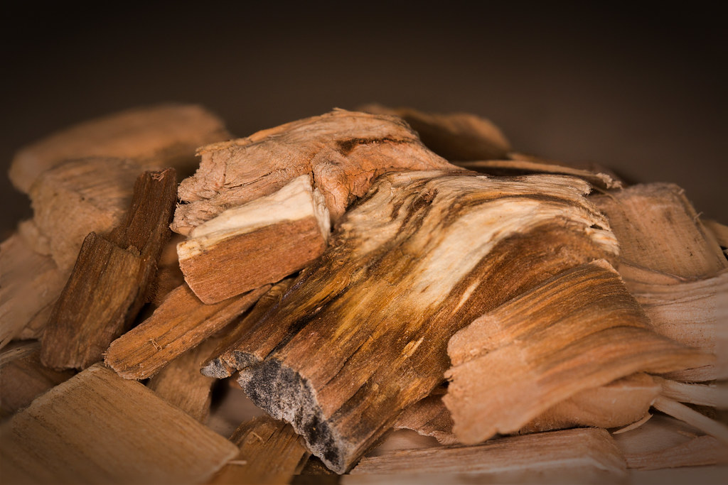 A close-up of a pile of wood chips used for smoking or grilling.