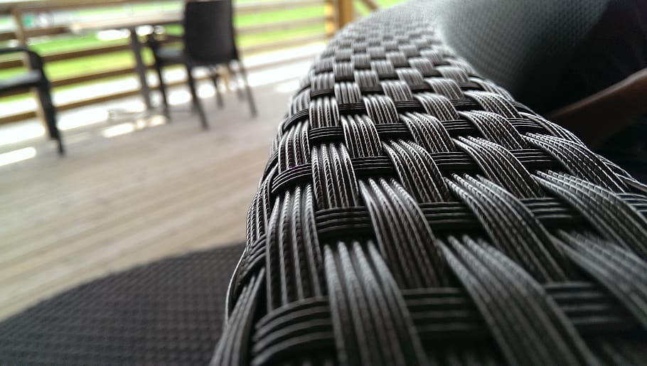 A close up shot of synthetic rattan fibres in a furniture