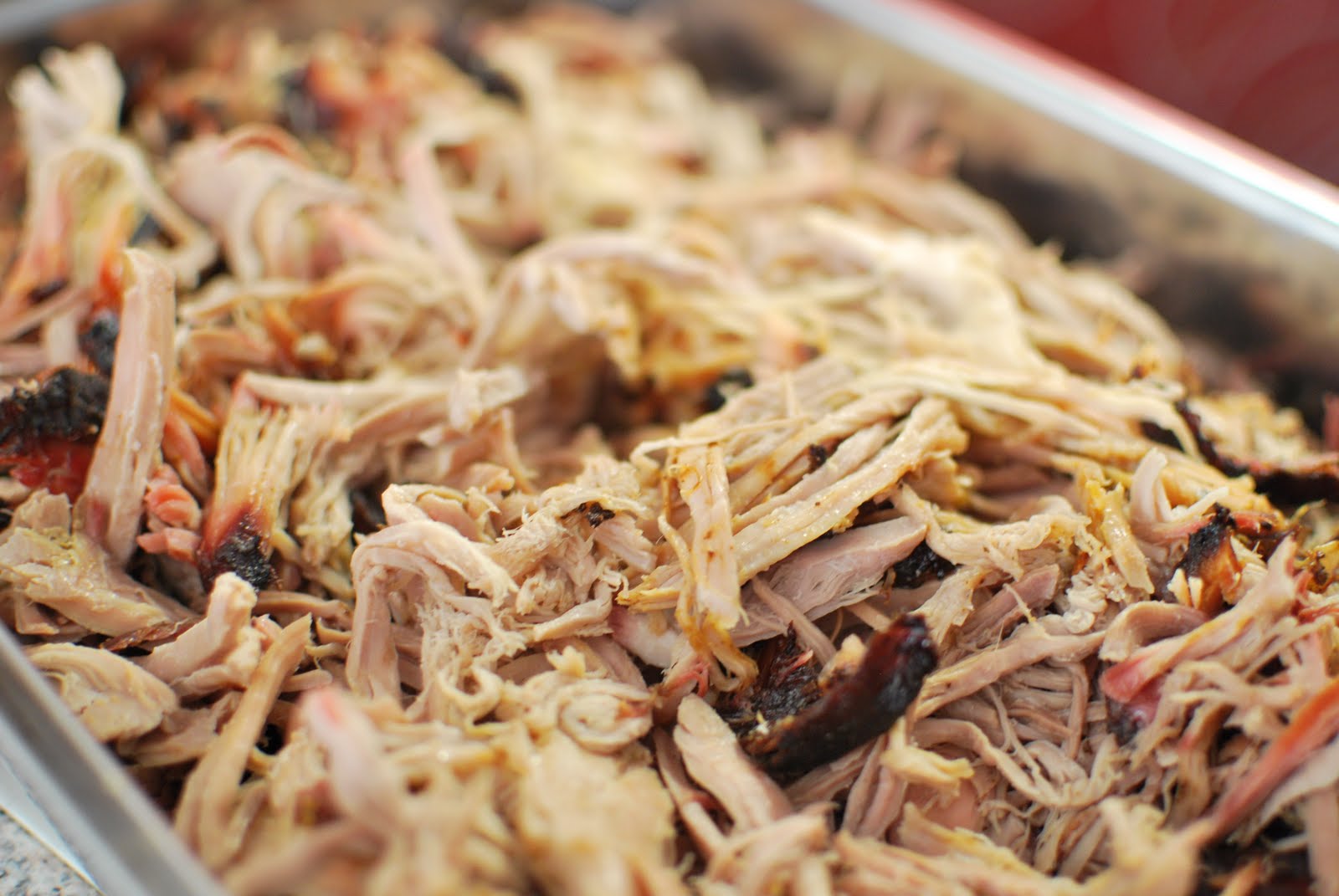 A plate of pulled pork, shredded.