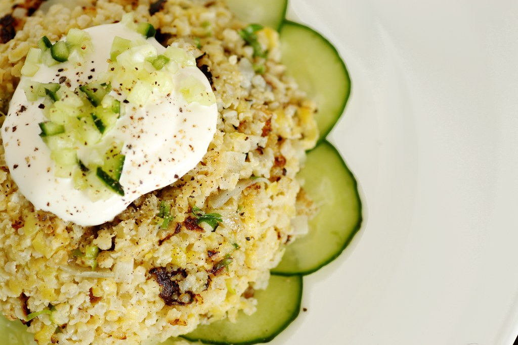 Couscous with sliced cucumber.